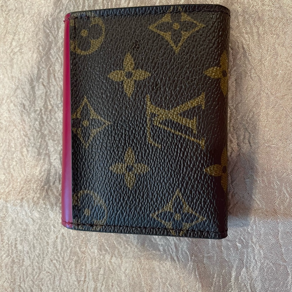 Louis Vuitton Zoe Wallet.